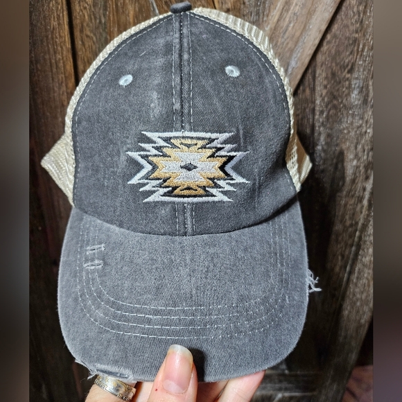 NWT Distressed Black And Cream Ponytail Trucker Cap With Aztec Embrodered Front